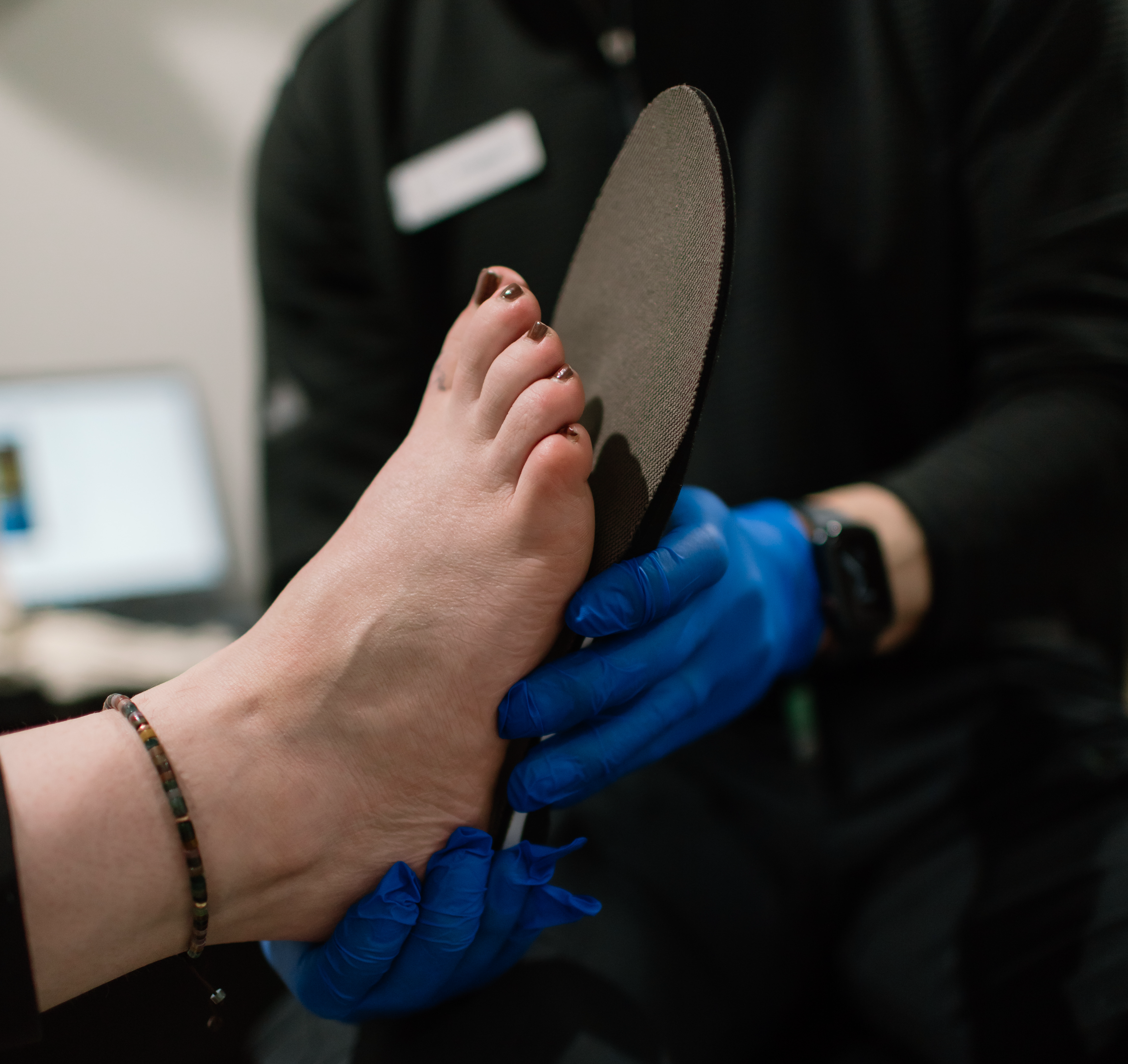 Patient getting fitted with orthotics by Chiropodist at The Foot Health Centre